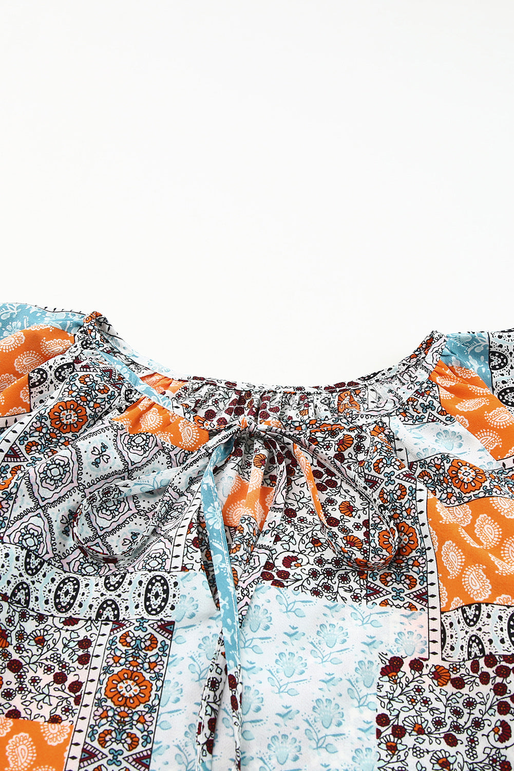 Printed Tie Neck Curved Hem Top-Pimamour