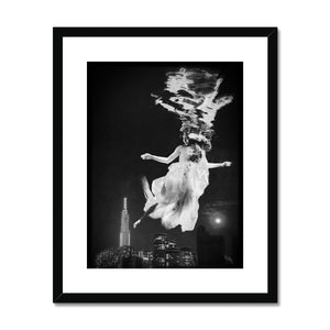 06 - Surreal dreamy poster of the protecting girl / goddess / mermaid floating in the sky over the city, wrapped in the night Black and White Framed & Mounted Print Pimamour Original Pimamour